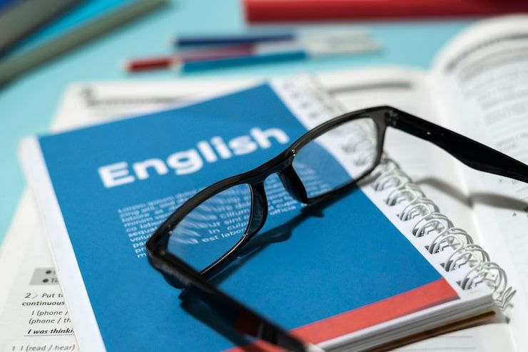 english-book-with-glasses-table_23-2149429624.jpg_uid=R63806068&ga=GA1.1.1411269396.1753471703&semt=ais_hybrid&w=740&q=80.png